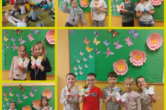 uczniowie z wykonanymi motylami z papieru